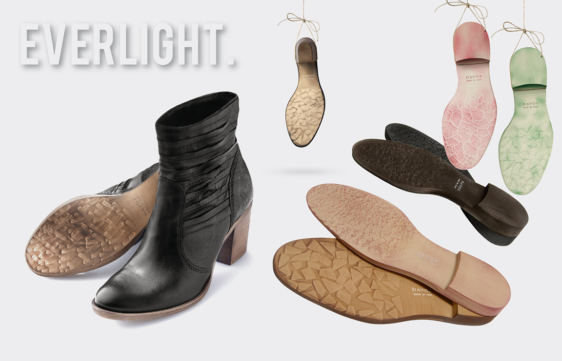 Everlight soles under a black leather ankle boot, with pink, green and tan sole units