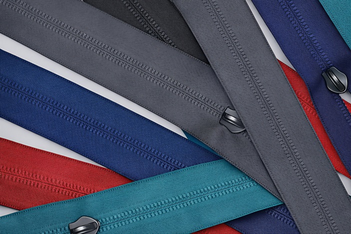 MAM water-repellent zippers in red, teal, navy and grey with sealed tape
