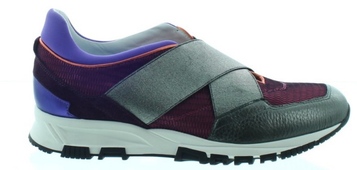 Sneaker with a wide elastic instep strap in place of laces